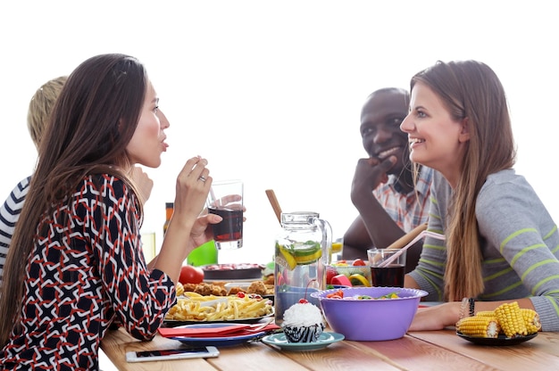 Happy people enjoying a meal together